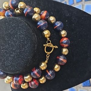 Red Black Lucite Goldtone Beaded Necklace.